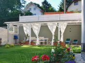 Pergola ke zdi domu